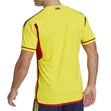 Back view of the Colombia home soccer jersey 2022 in yellow with red accents for fans