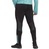 Back view of Adidas Colombia training tracksuit 2022 featuring black pants with red accents