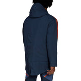 Back view of Manchester United bench parka jacket 2022 in navy with red stripes and a hood