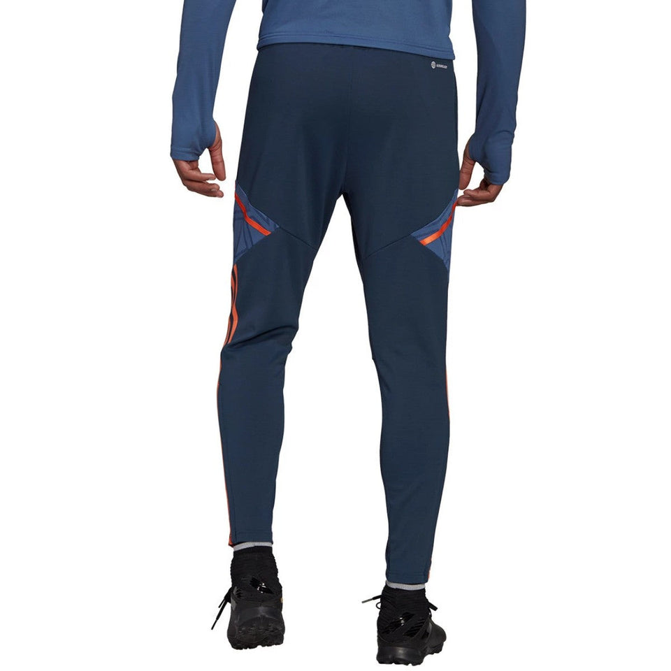 Back view of Adidas Manchester United hooded tracksuit featuring slim-fit pants for comfort and style