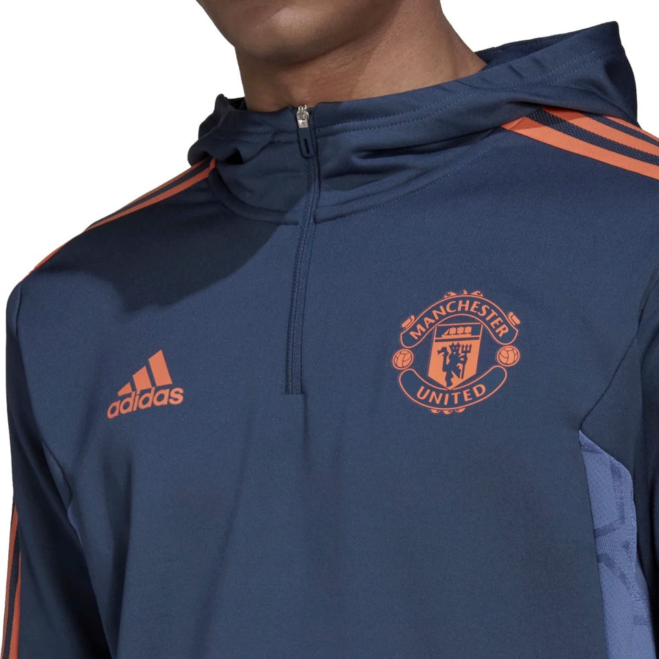 Adidas Manchester United hooded tracksuit featuring the iconic club crest and stylish design