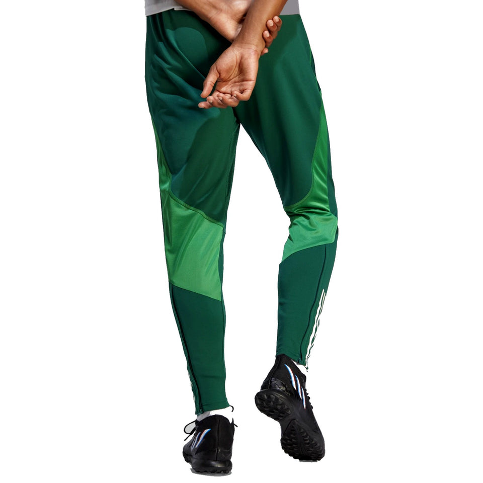 Back view of green Mexico soccer tracksuit 2022 pants with athletic fit and black cleats
