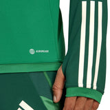 Close-up of green Mexico soccer tracksuit 2022 sleeve and pants with white stripes and Aeroready fabric