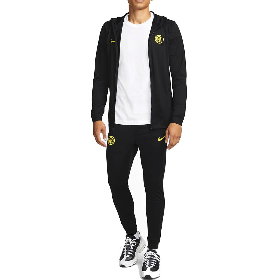 Inter Milan Nike UCL tracksuit 2022 23 featuring a black hooded jacket and matching pants