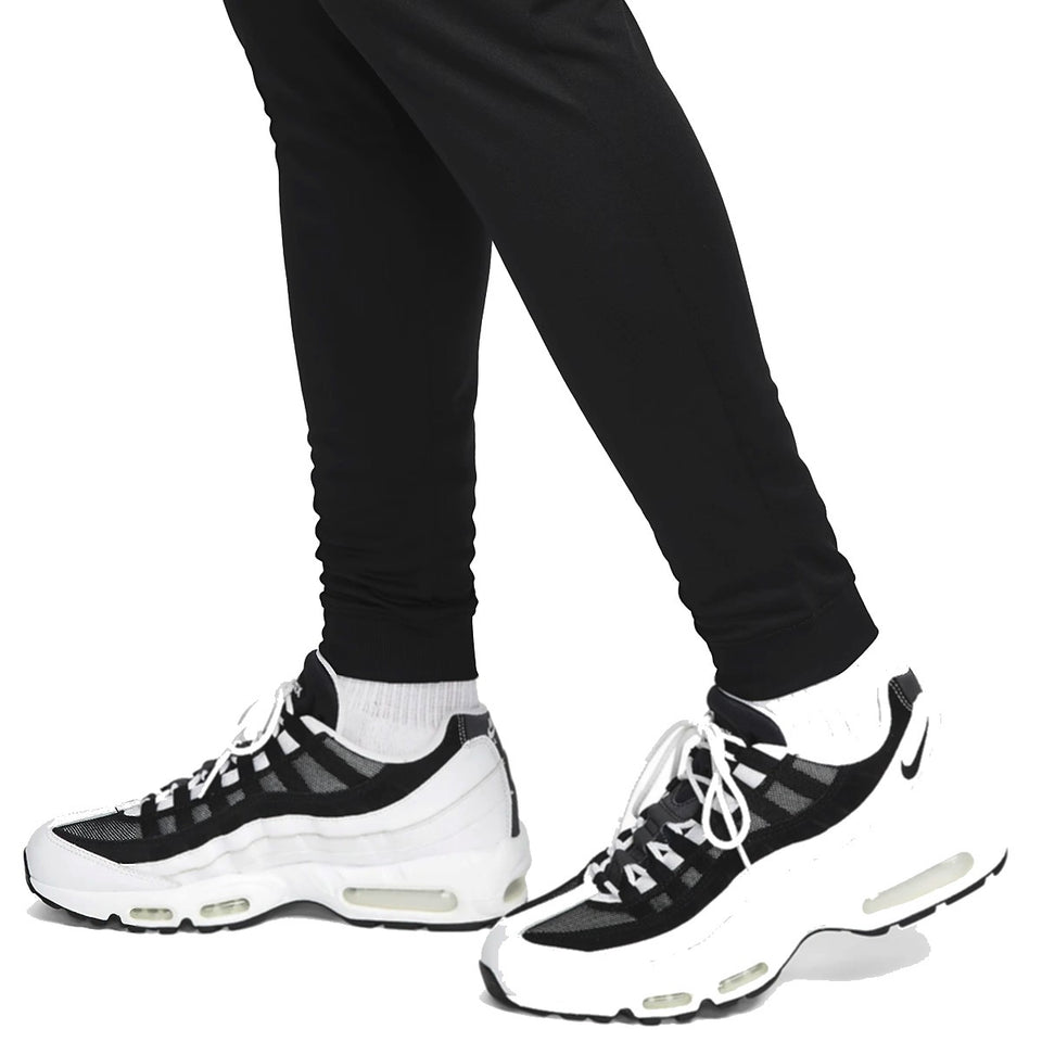 Black Nike tracksuit pants styled with Inter Milan Nike UCL tracksuit 2022 23 and matching sneakers