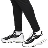 Black Nike tracksuit pants styled with Inter Milan Nike UCL tracksuit 2022 23 and matching sneakers