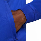 Close-up of hand in pocket of blue Nike PSG soccer tracksuit sleeve buy Nike PSG soccer tracksuit online