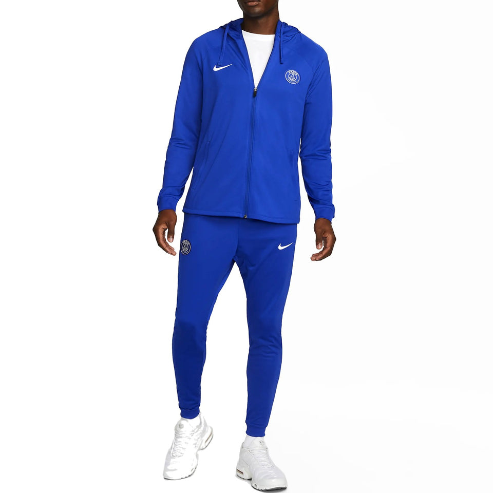 Blue Nike PSG soccer tracksuit with zip-up jacket and pants modeled for casual athletic wear buy Nike PSG soccer tracksuit online