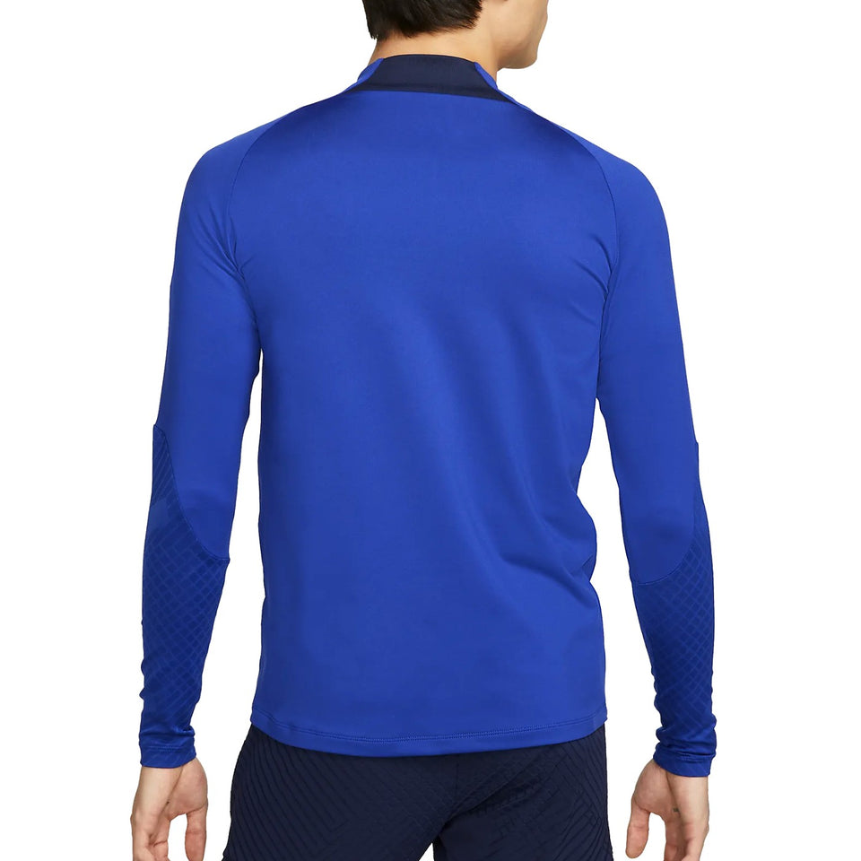 Back view of man wearing blue Chelsea training tracksuit 2022 2023 top with black collar and textured sleeves