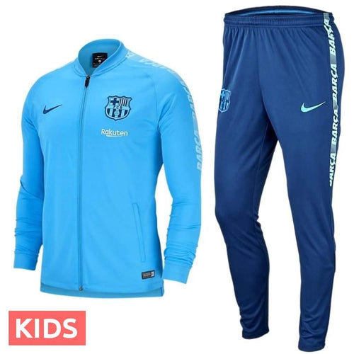 Kids FC Barcelona tracksuit with blue zip jacket and navy pants featuring Nike and team logos