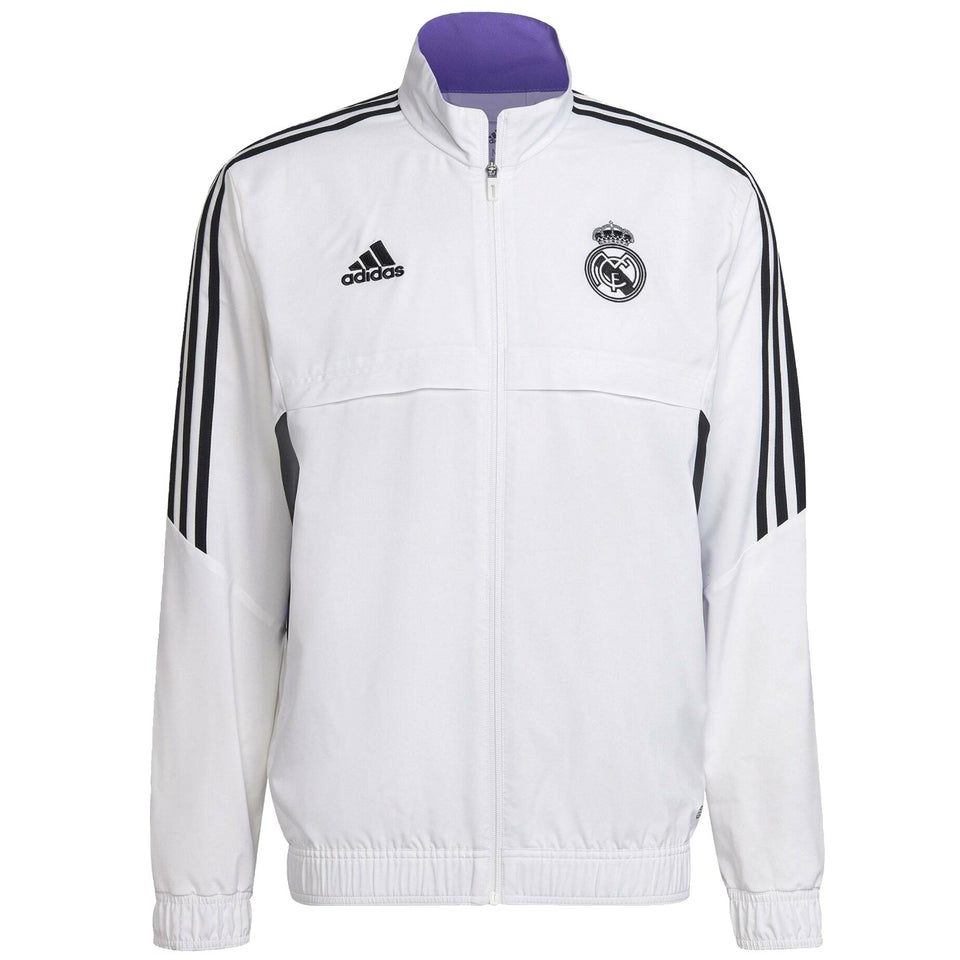 Real Madrid white presentation tracksuit 2022 featuring the Adidas logo and team crest for fans