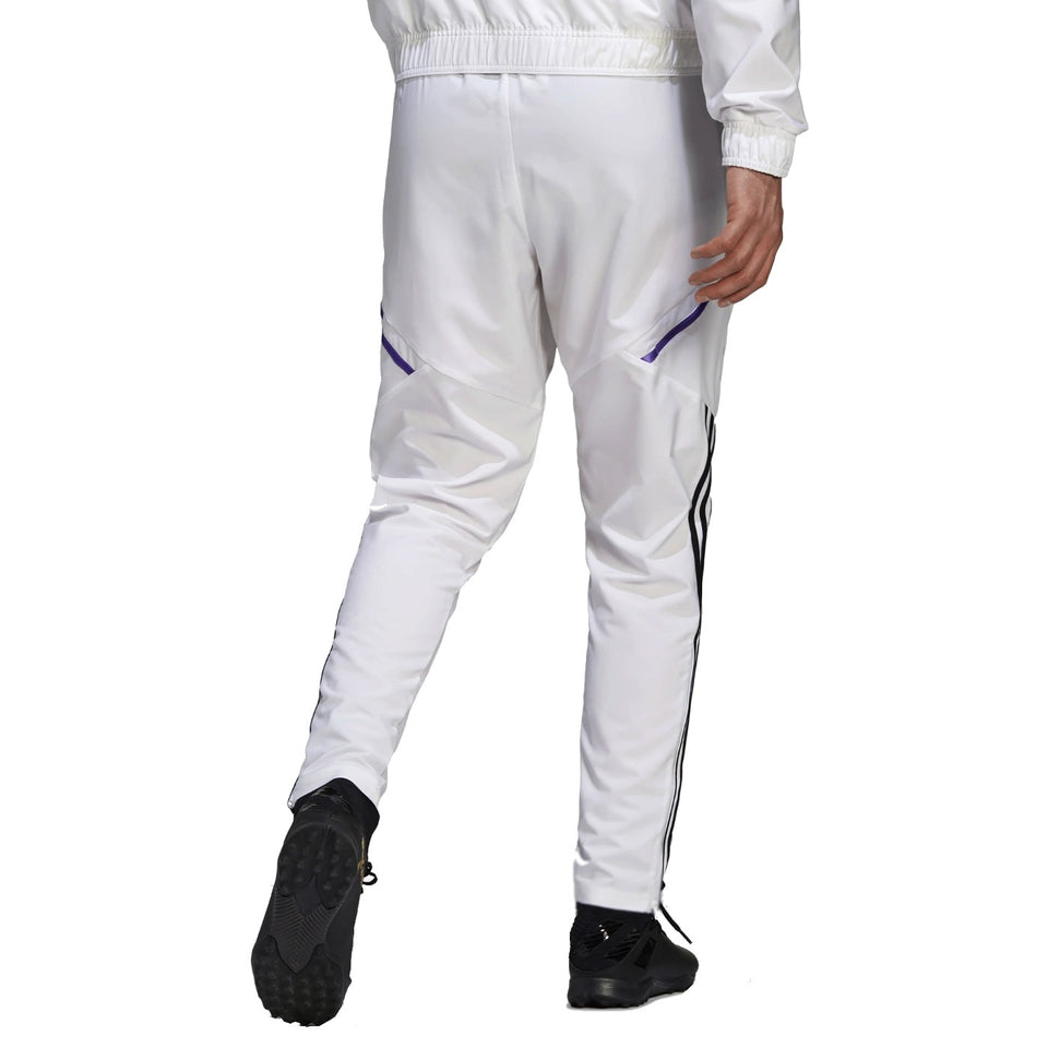 Back view of the Real Madrid white presentation tracksuit 2022 with sleek design and stylish fit.